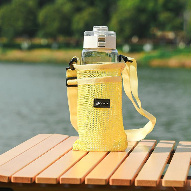 Yellow mesh water bottle holder bag with adjustable shoulder strap and front pocket