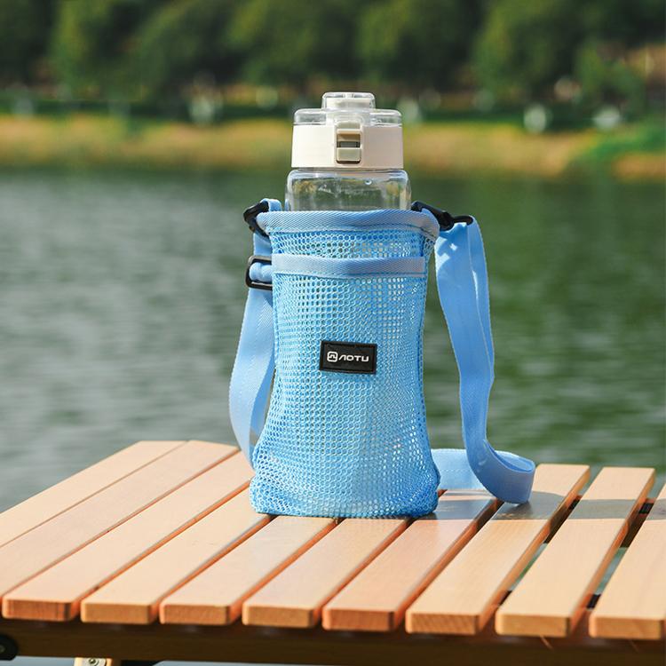 Light blue mesh water bottle holder bag with adjustable shoulder strap and front pocket