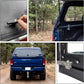 T-handle body lock mounted on a camper car door with keys shown