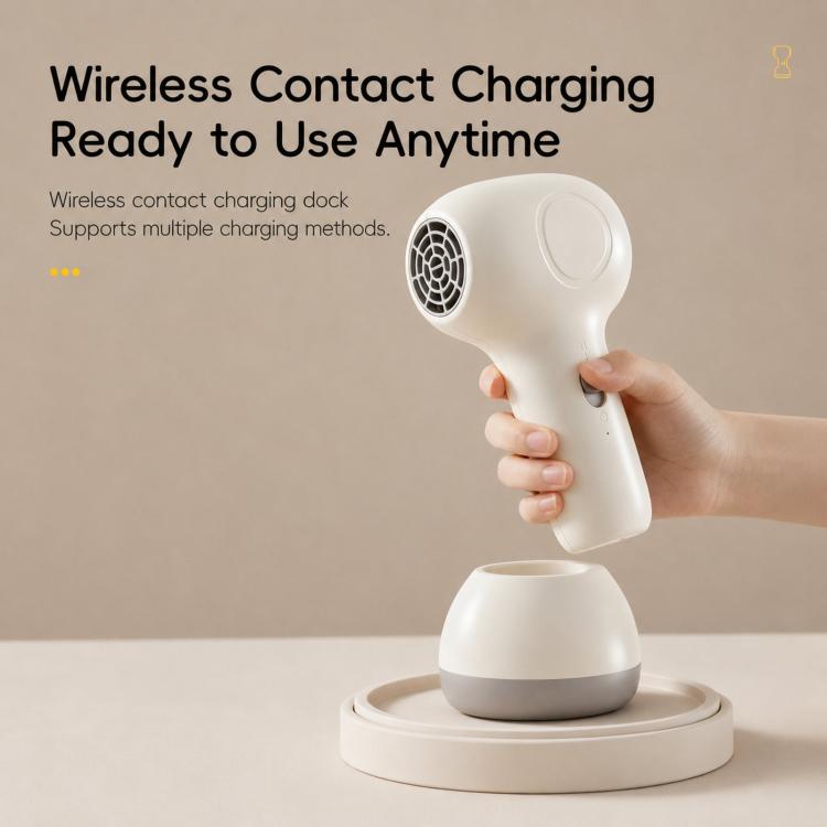 White cordless baby hair dryer on contact charging base with dock stand