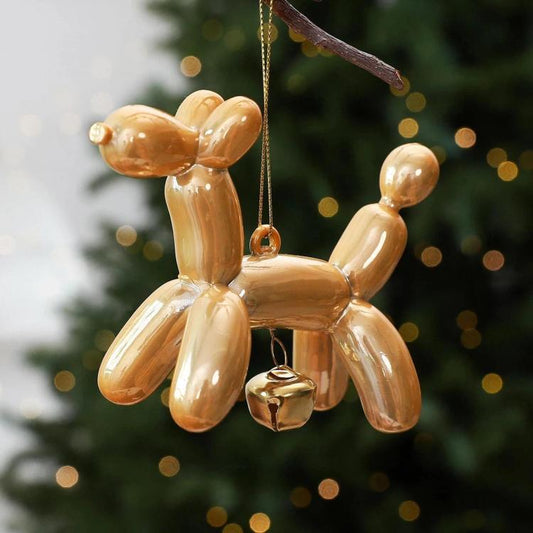 Gold balloon dog Christmas tree ornament with hanging loop and small bell charm