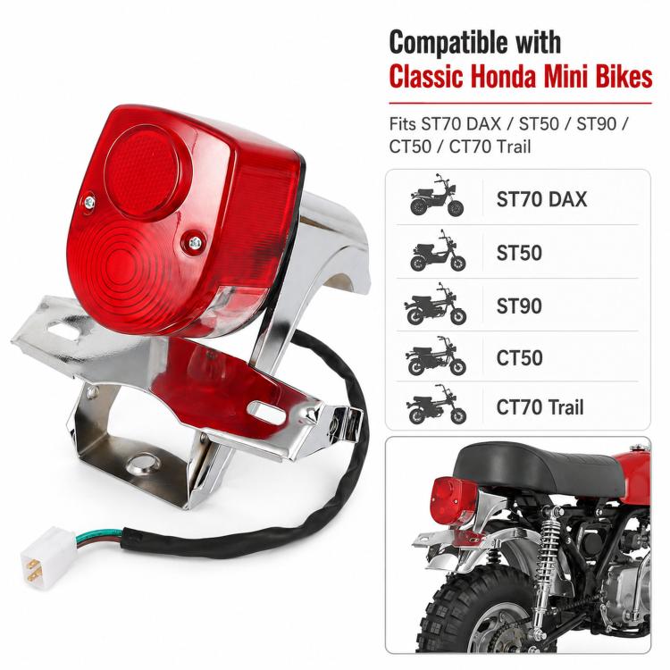 Rear tail light assembly with red lens, chrome bracket, and black wire harness