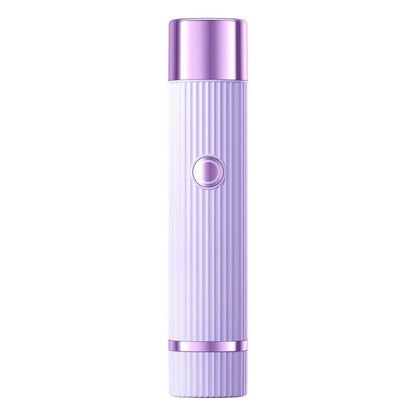 Cordless electric body hair trimmer in purple with ribbed handle and round power button