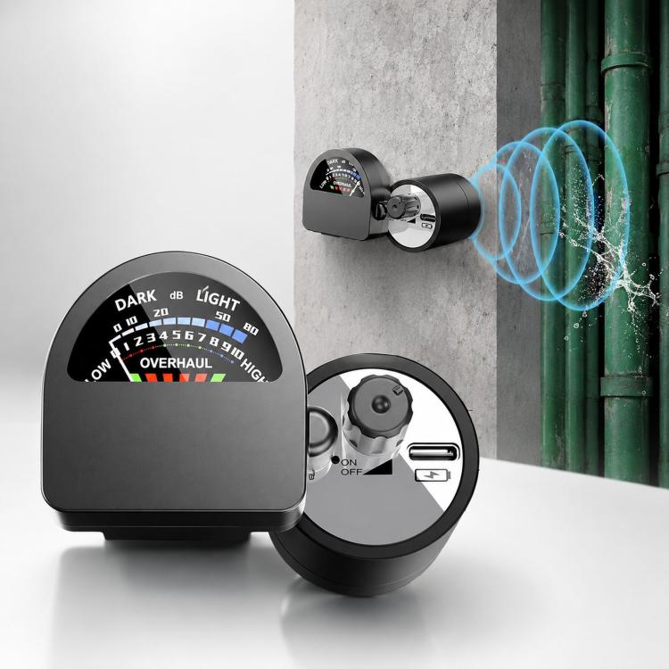 Black portable water leak detector with audio field strength meter and circular sensor