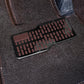 Brown anti-slip stainless steel car heel protector plate with textured rubber grip