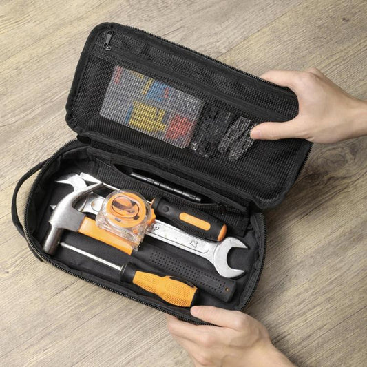 Black zippered tool storage bag open with mesh top panel and molded tool holders