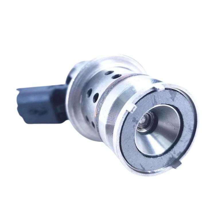 Urea injector nozzle end with circular opening and dark cable connector