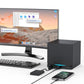 Black USB hub docking to a console, with blue USB-A ports and connected smartphone.