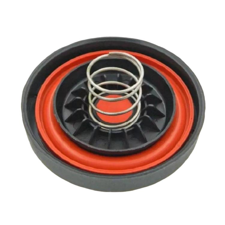 Valve cover gasket and spring seal with black center, orange ring, and coiled spring