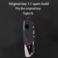 Black silicone key cover with honeycomb texture and side button cutouts, blue/red stripe