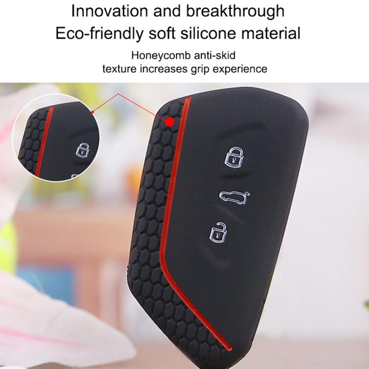 Black silicone key fob cover with red trim and textured honeycomb grip