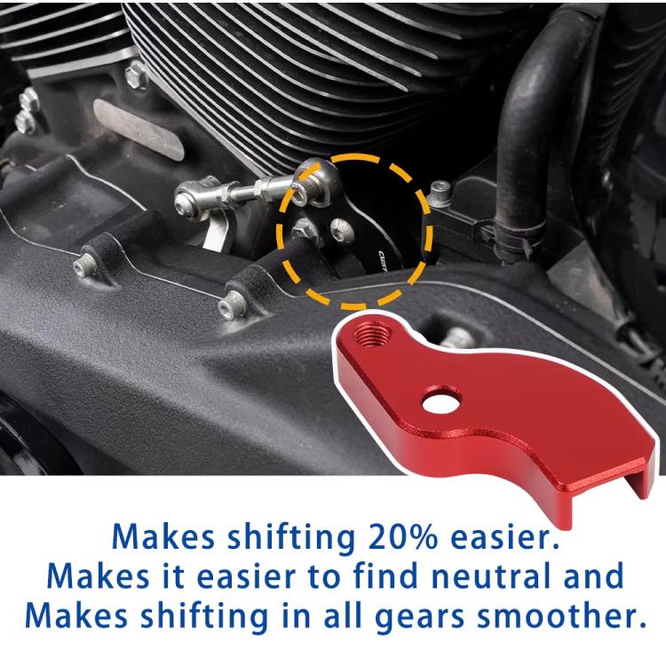 Red shift lever kit installed near motorcycle engine, showing lever arm and bolt