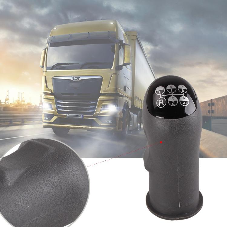 Black truck gear shift knob with numbered shift dial on glossy top
