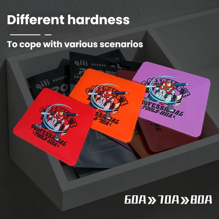 Assorted double-sided wrapping film scraper pads in red, orange, and purple
