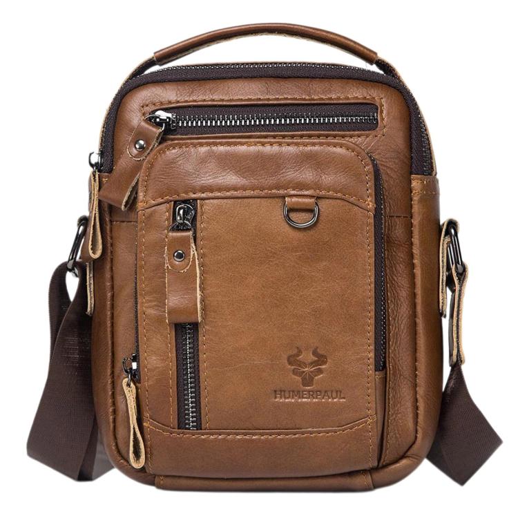 Light brown leather vintage crossbody bag with front zip pocket and top handle