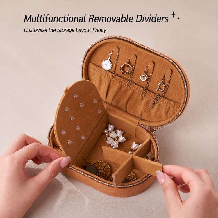 Brown velvet oval jewelry case with zipper, open with divider trays and earring panels