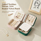 Mini velvet travel jewelry boxes, one open and one closed, with necklace storage area
