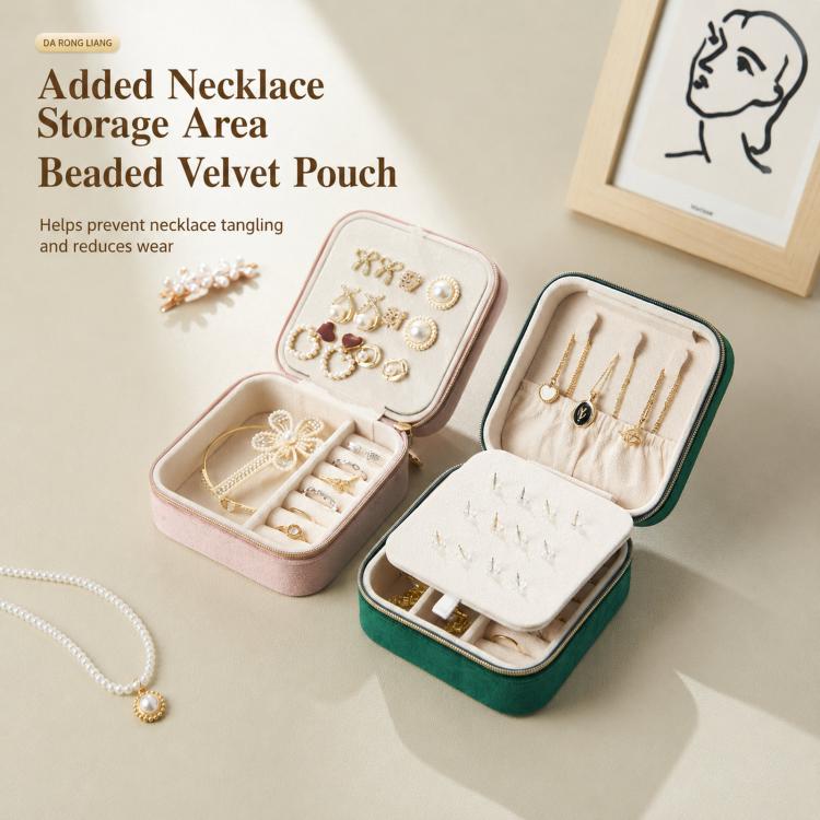 Mini velvet travel jewelry boxes, one open and one closed, with necklace storage area