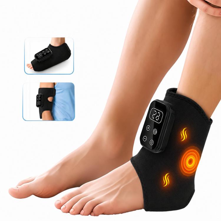 Black heated ankle brace with controller on side, showing warm heat glow