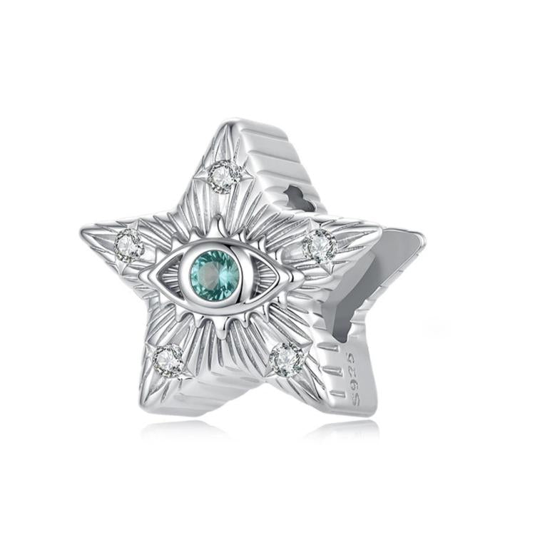 Sterling silver star-shaped bead charm with blue-green crystal eye and clear stones
