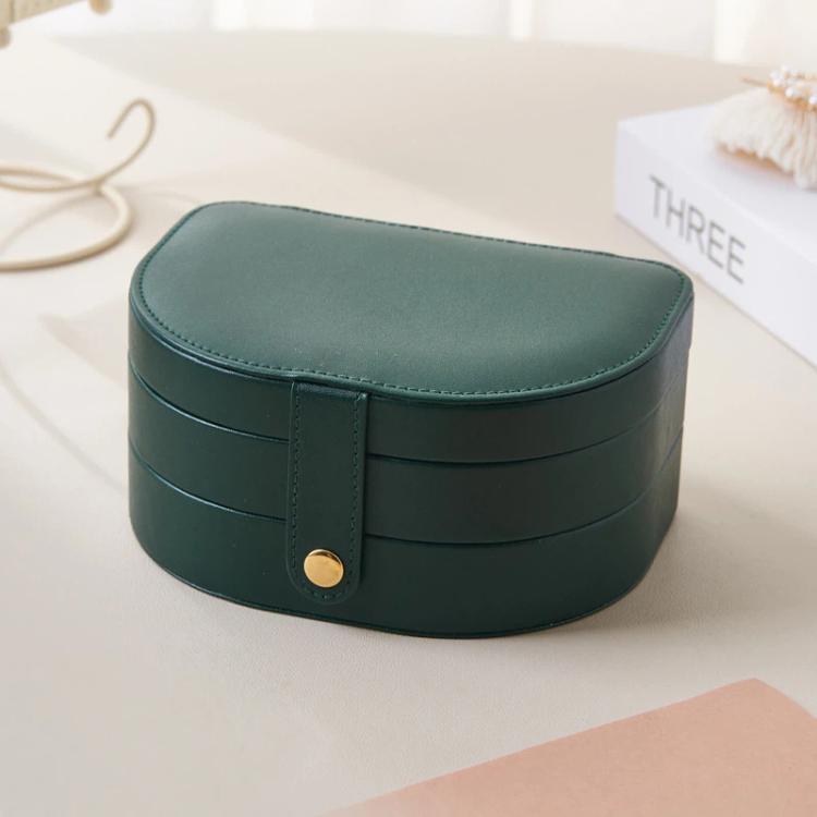 Dark green shell-shaped 3-tier jewelry box with flip-top lid and gold-tone clasp