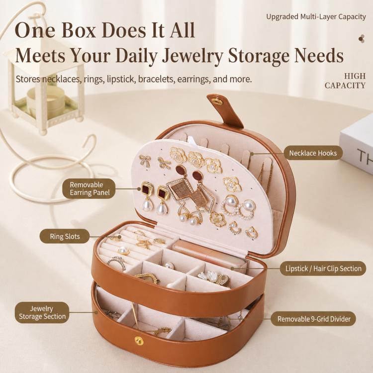 Open brown shell-shaped jewelry box with multi-layer compartments for jewelry storage