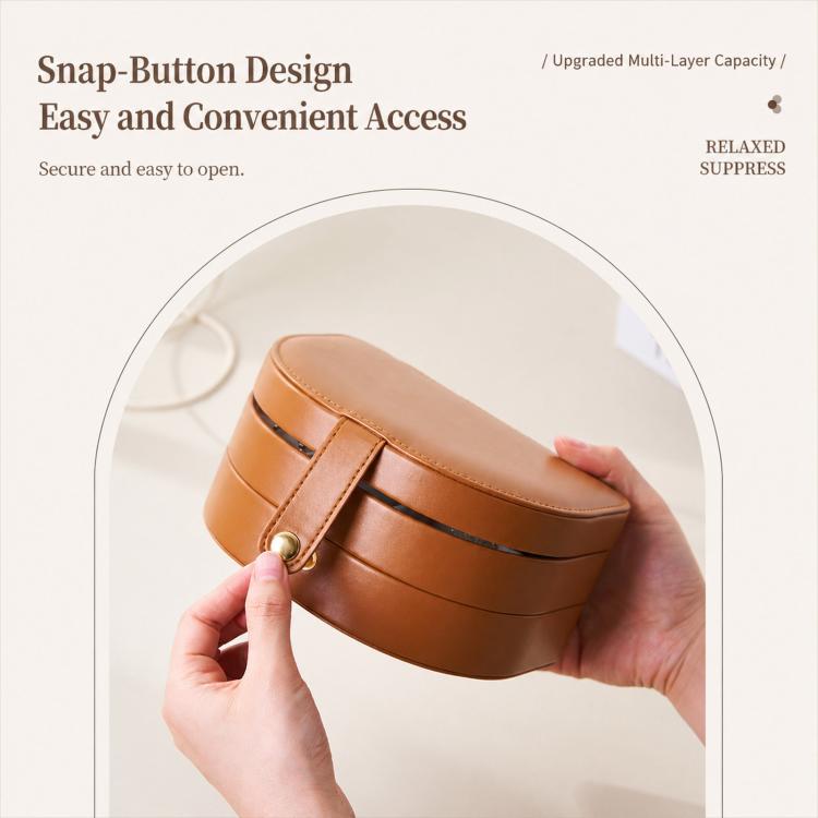 Brown shell jewelry box with snap-button closure and flip-top lid