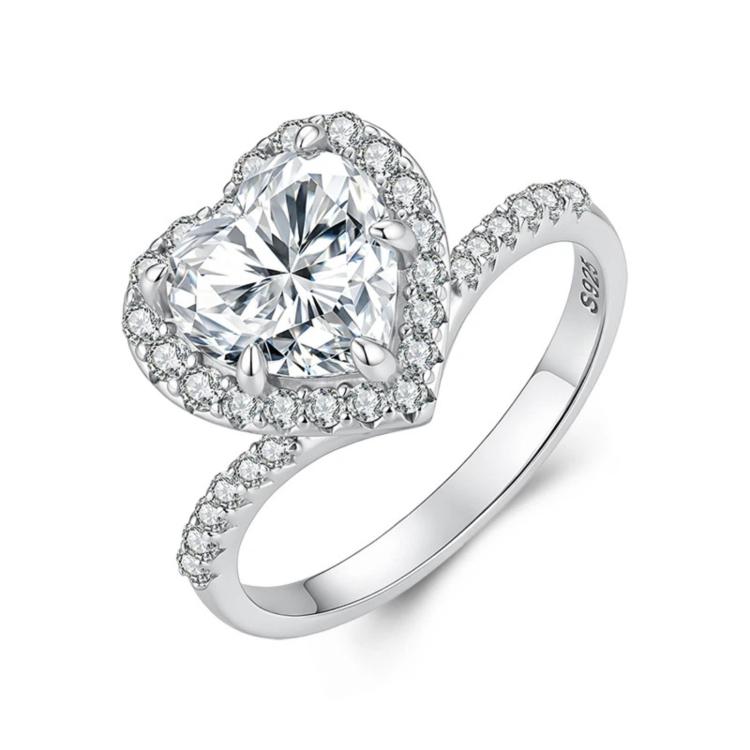Heart-shaped moissanite ring in sterling silver with halo of small stones