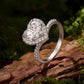 Heart-shaped moissanite ring with pavé band in sterling silver