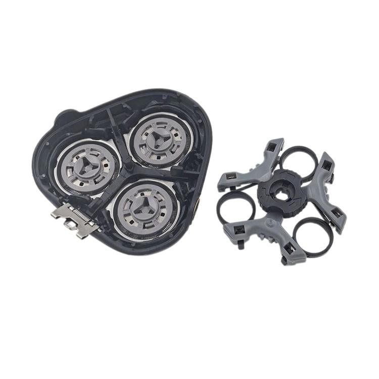 Replacement shaver head components set: three rotary cutter housings and mounting parts.