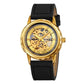 Gold-tone skeleton automatic watch with black leather strap