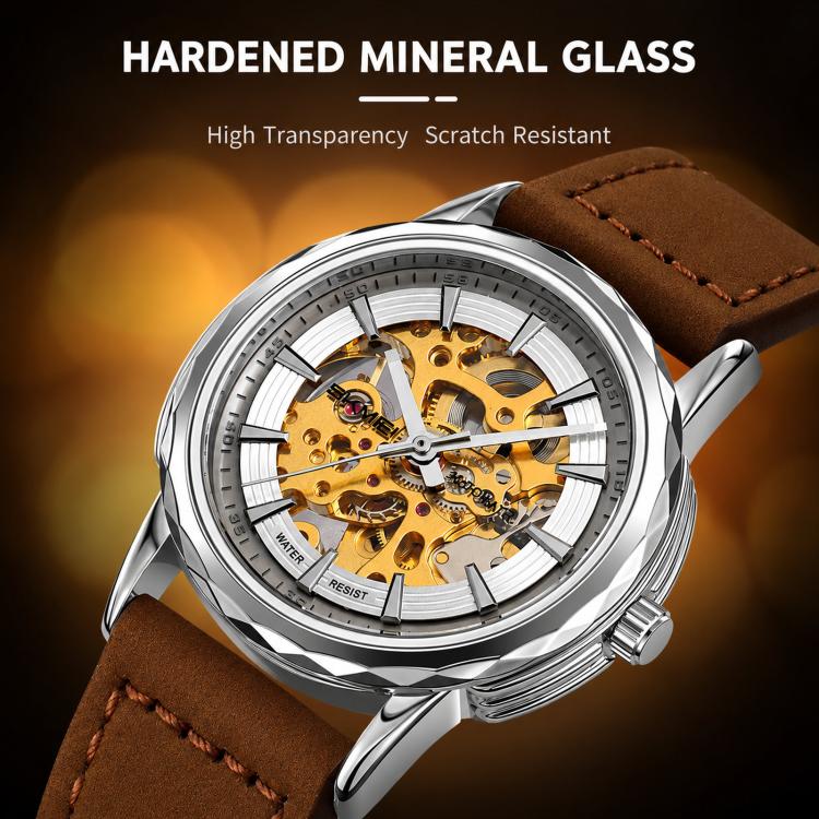 Silver-tone skeleton automatic watch with brown leather strap, side crown visible