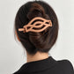 Peach-orange matte curved twist hair barrette clip for updo styling