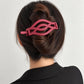 Pink matte curved twist hair barrette clip for securing an updo