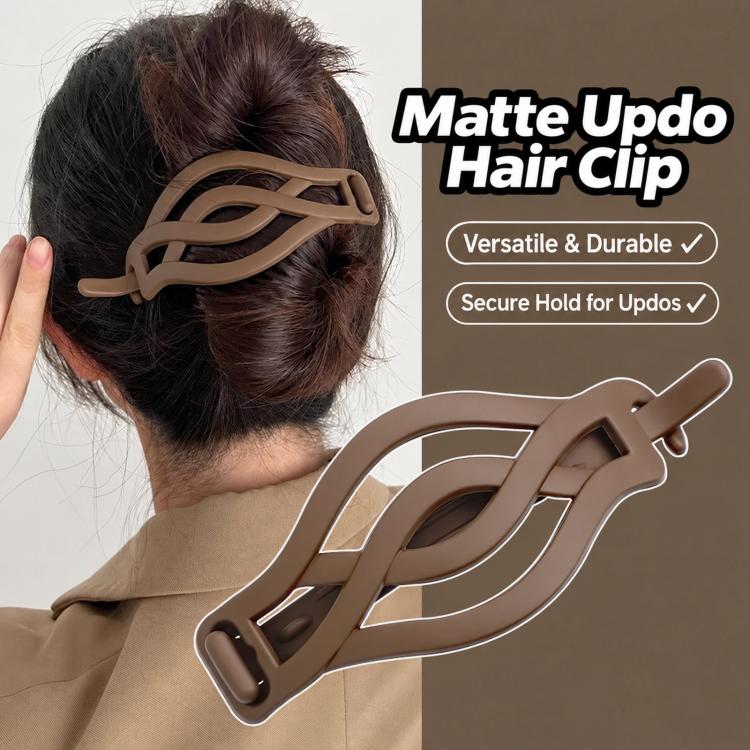 Tan matte curved twist hair clip on an updo hairstyle