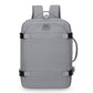 Gray expandable travel backpack with zip front pocket, top handle, and side carry loop.