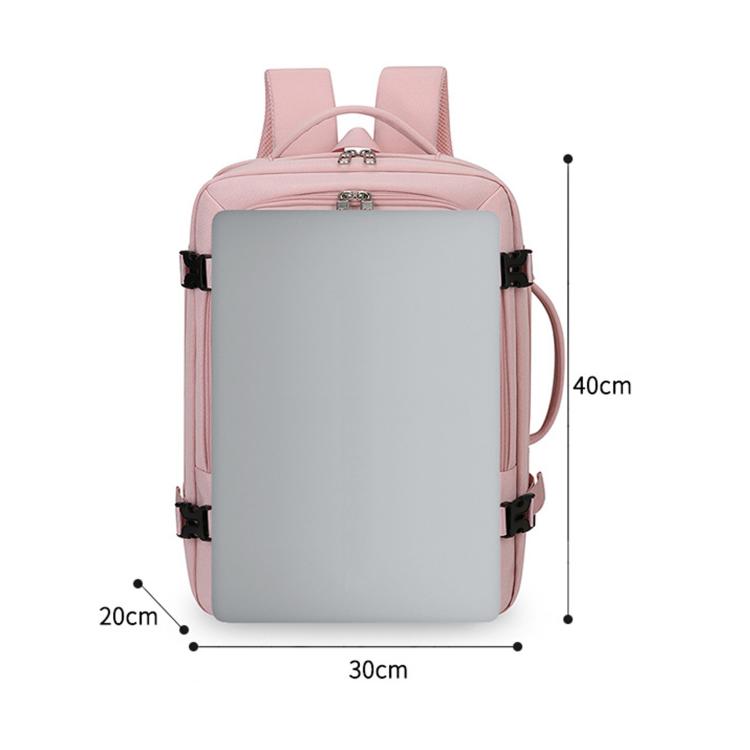 Pink expandable travel backpack front view with side handle loop and luggage strap.