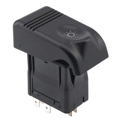 Black car headlight control switch with dash light icon and metal pin terminals