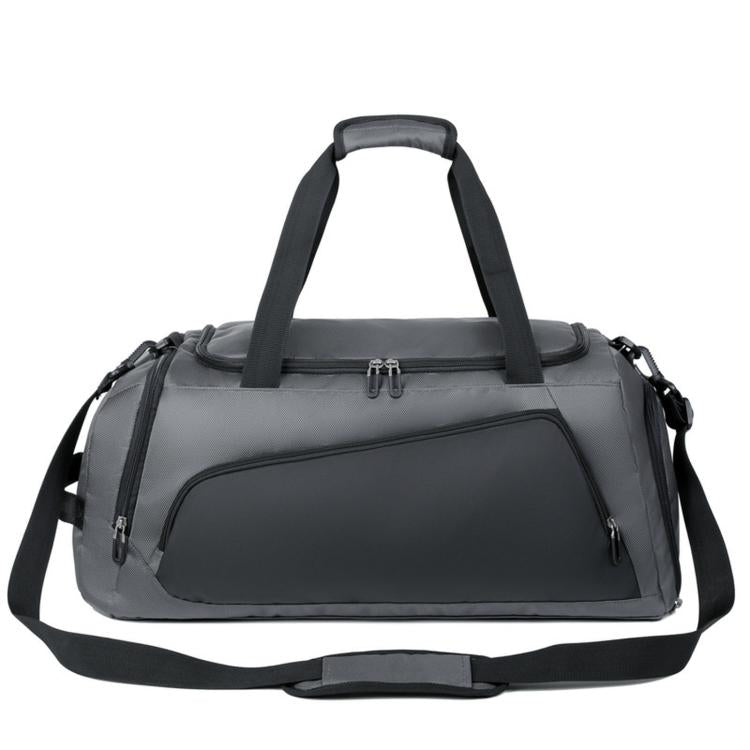 Gray large gym duffel bag with top handle, shoulder strap, and front zip compartments.