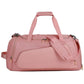 Large pink gym duffel bag with top handle, side carry strap, and zip front pocket.