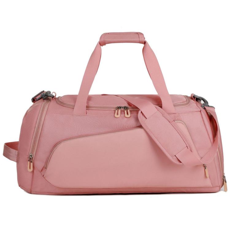 Large pink gym duffel bag with top handle, side carry strap, and zip front pocket.