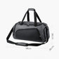 Large gym duffle bag with top handles, detachable shoulder strap, and front zip pocket