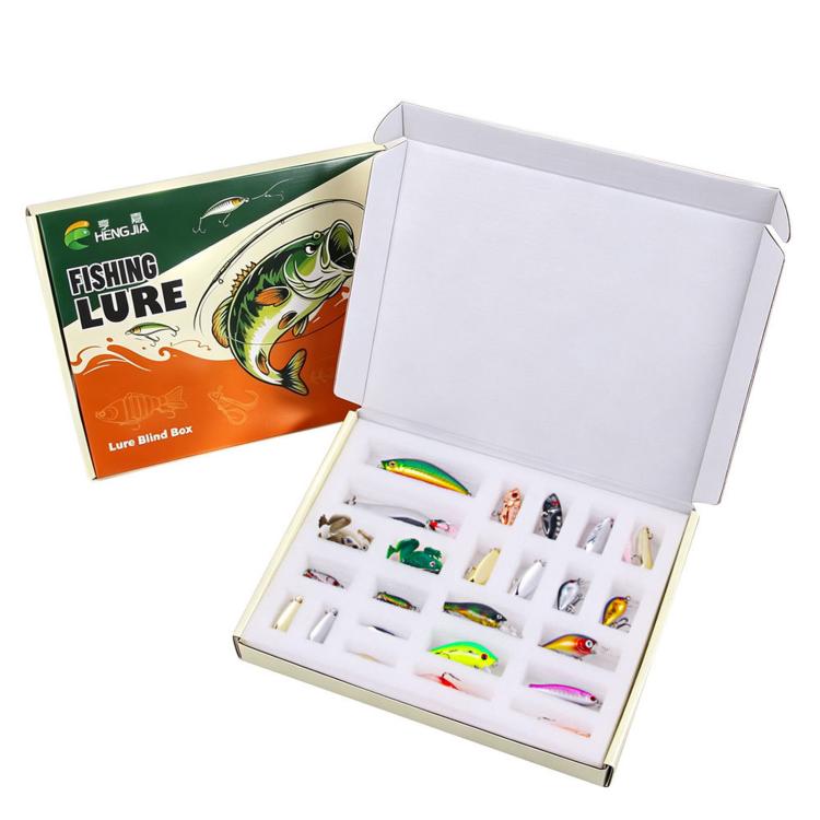 Fishing lure kit box open, showing multiple lures stored in separate compartments