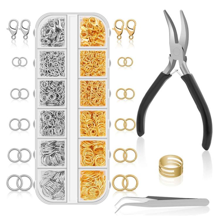 Jewelry making kit with lobster clasps, jump rings, and pliers, mixed silver and gold.