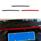 Installed trunk decorative car sticker strip with red accent stripe on black trim