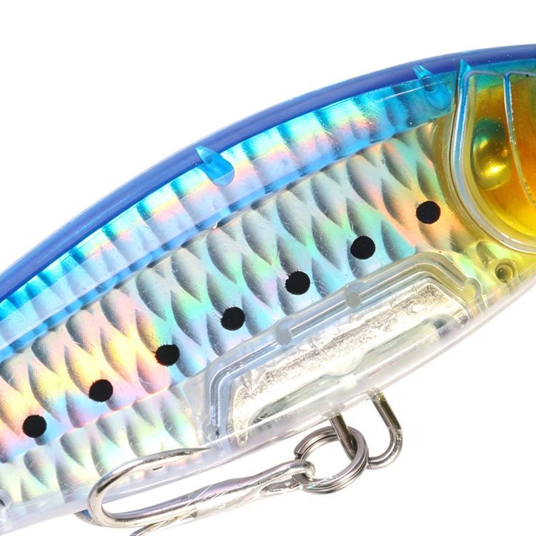 Iridescent blue sinking pencil lure with black dots and treble hooks