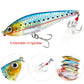 Colorful hard fishing lure with feather treble hooks and glossy blue-yellow finish