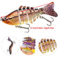 Brown multi-segment hard fishing swimbait lure with treble hooks