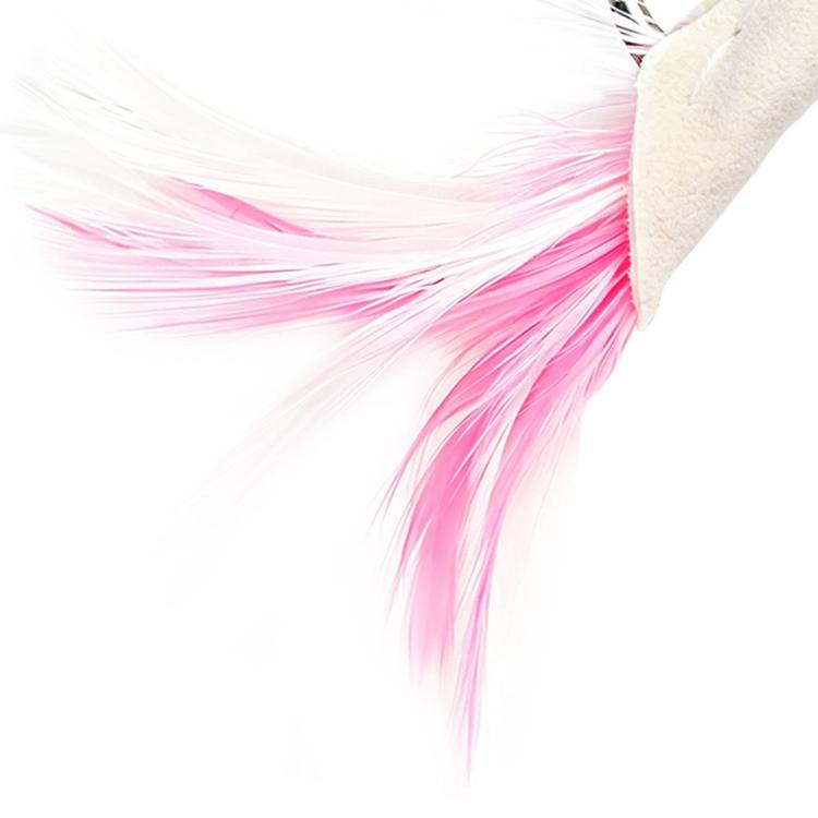 Close-up pink and white feather tail on a silver feather jig lure head