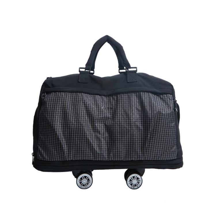 Black nylon rolling duffel bag with detachable wheels and dual top handles